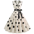 Robe rétro femme à pois – Col V et jupe évasée