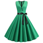 Robe rétro femme à pois – Col V et jupe évasée