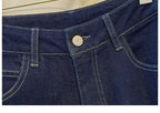 Jean large femme bleu foncé – Revers rayés