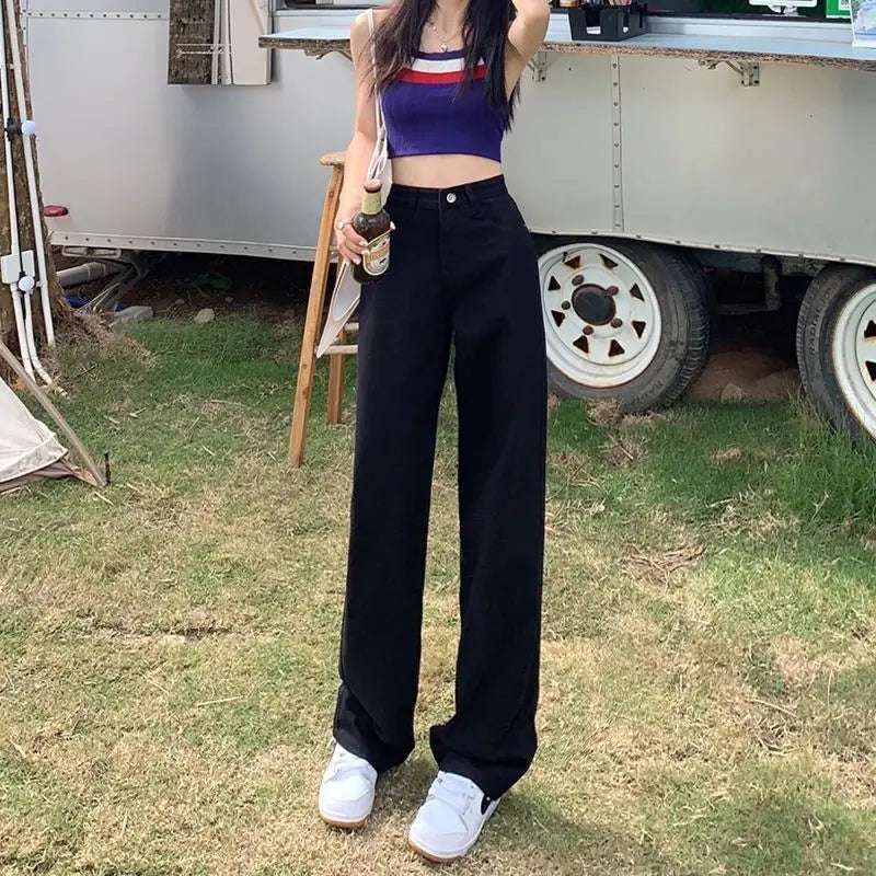 Women's vintage wide-leg jeans, loose straight cut, high-waisted, slimming, petite-friendly, with a drapey, floor-length design