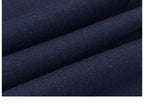 Jean large femme bleu foncé – Revers rayés