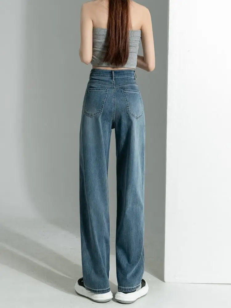 Women's vintage wide-leg jeans, loose straight cut, high-waisted, slimming, petite-friendly, with a drapey, floor-length design