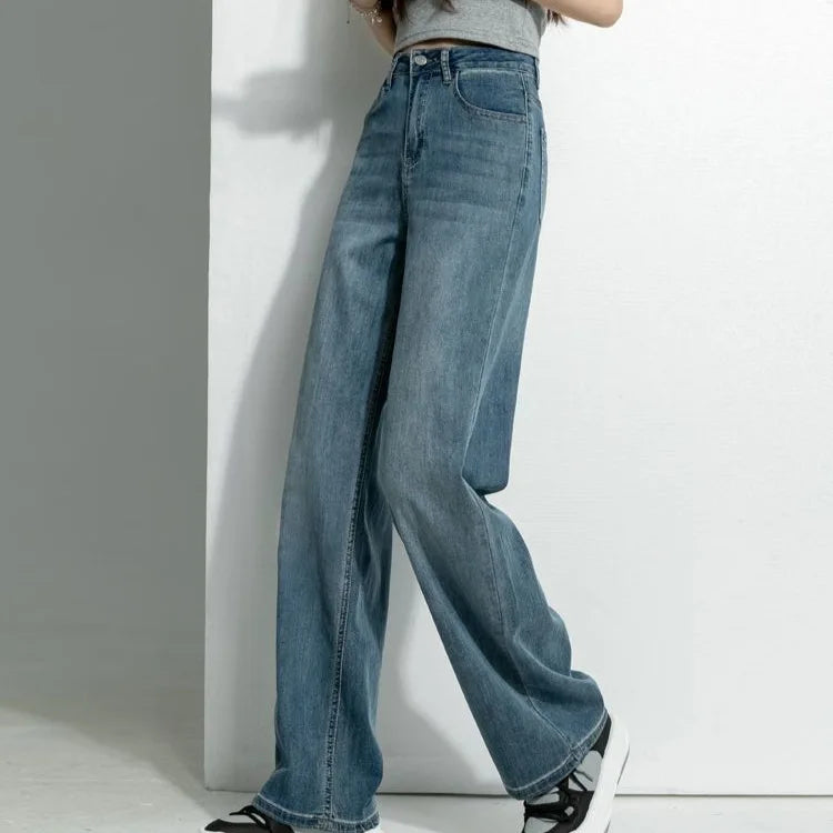 Women's vintage wide-leg jeans, loose straight cut, high-waisted, slimming, petite-friendly, with a drapey, floor-length design