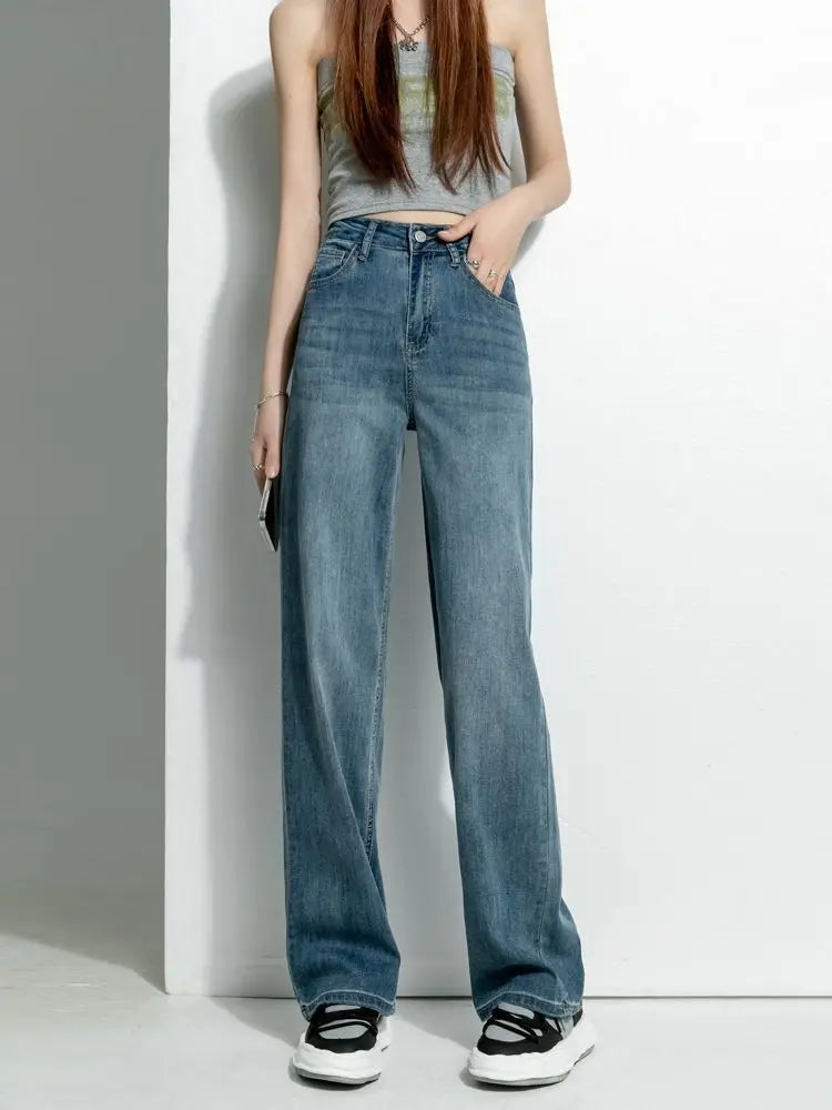 Women's vintage wide-leg jeans, loose straight cut, high-waisted, slimming, petite-friendly, with a drapey, floor-length design
