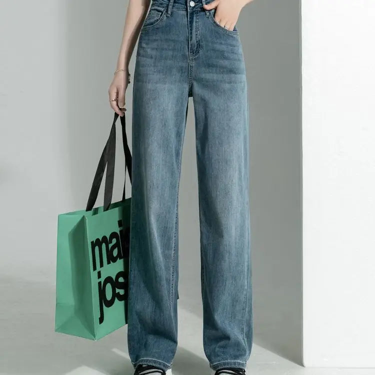 Women's vintage wide-leg jeans, loose straight cut, high-waisted, slimming, petite-friendly, with a drapey, floor-length design