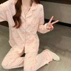 Pyjama femme rose à rayures et nœuds – Ensemble long