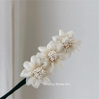 Accessoire à chignon fleuri – Ornements effet perlé