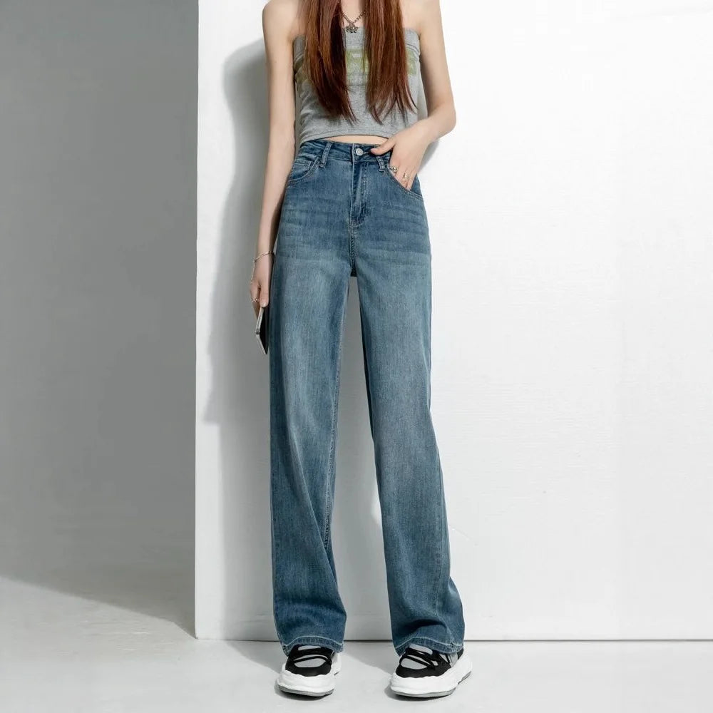 Women's vintage wide-leg jeans, loose straight cut, high-waisted, slimming, petite-friendly, with a drapey, floor-length design