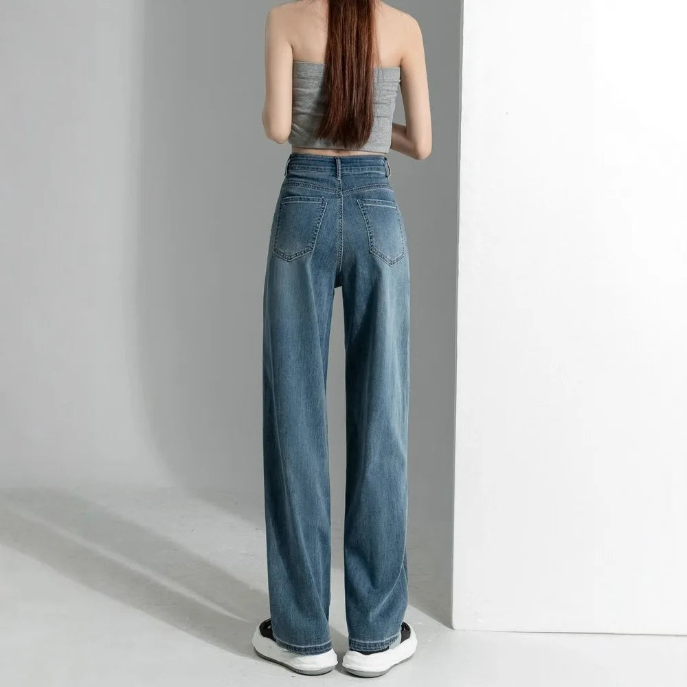 Women's vintage wide-leg jeans, loose straight cut, high-waisted, slimming, petite-friendly, with a drapey, floor-length design