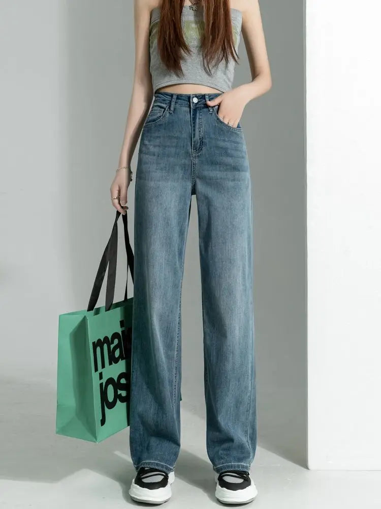 Women's vintage wide-leg jeans, loose straight cut, high-waisted, slimming, petite-friendly, with a drapey, floor-length design